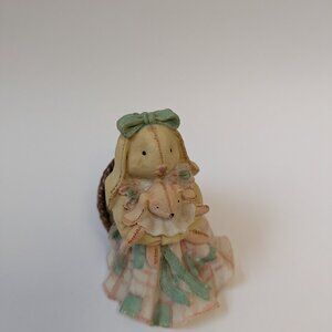 Rabbit with it's toy vintage house decoration